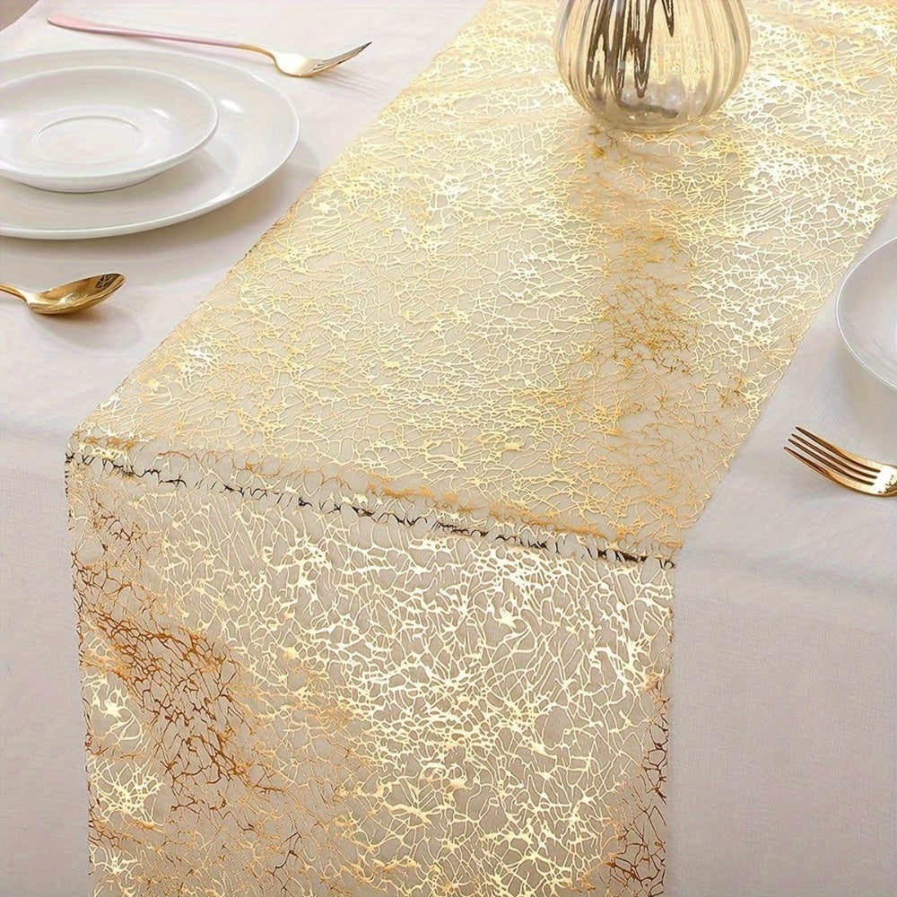 Golden polyester organza table runner with glitter accents, ideal for weddings, showers, and parties.