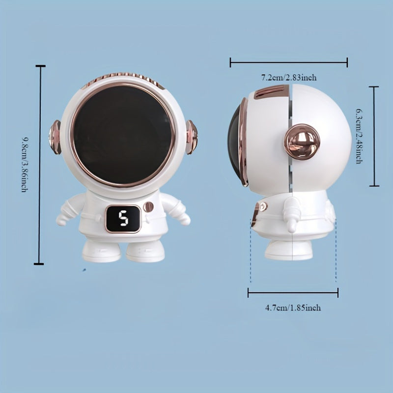 Spaceman Portable Electric Fan - Cartoon Astronaut Mini Hand Fan with Three-Speed Adjustment, Quiet Leafless Design, USB Charging, Rechargeable Battery for Indoor and Outdoor Use.