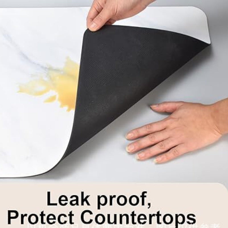 Kitchen countertop mat made of non-slip rubber, featuring durable tech cloth for the dish drainer pad. Easy to clean and water absorbent. Suitable for kitchen use; hand wash only.