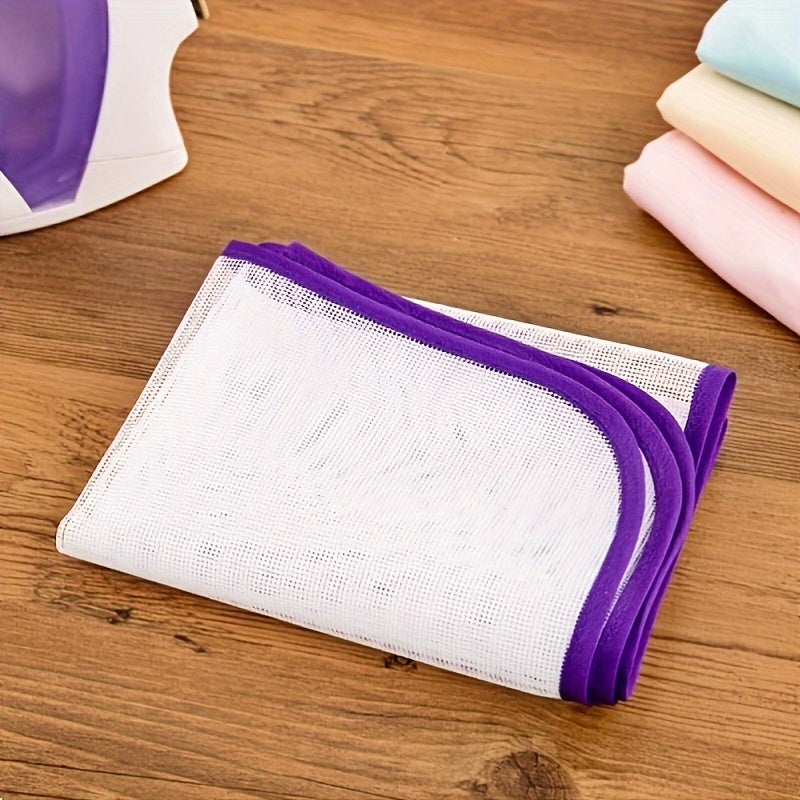 Heat-resistant mesh pad protects clothes during ironing; no need for electricity; color varies.