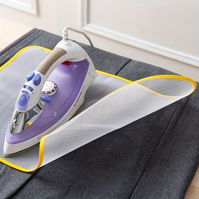 Heat-resistant mesh pad protects clothes during ironing; no need for electricity; color varies.