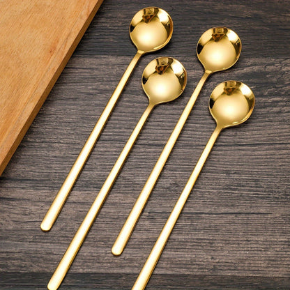 Set of 4 high-quality stainless steel beverage spoons with an elegant design and durable construction. Features a long handle for effortless stirring, making them ideal for use with espresso, tea, and iced drinks.