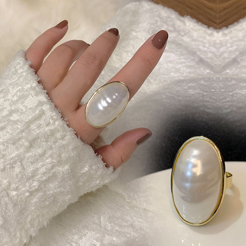 Stylish Faux Pearl Ring with Adjustable Fit - Modern Geometric Style, Ideal for Special Occasions, Ellipse Shape, Open Shank, Trendy Accessory, Model J213