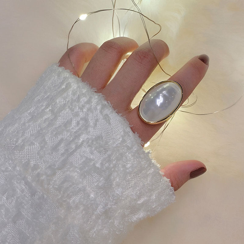 Stylish Faux Pearl Ring with Adjustable Fit - Modern Geometric Style, Ideal for Special Occasions, Ellipse Shape, Open Shank, Trendy Accessory, Model J213