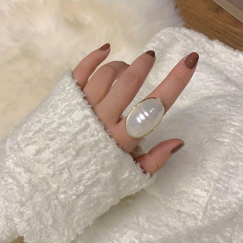 Stylish Faux Pearl Ring with Adjustable Fit - Modern Geometric Style, Ideal for Special Occasions, Ellipse Shape, Open Shank, Trendy Accessory, Model J213