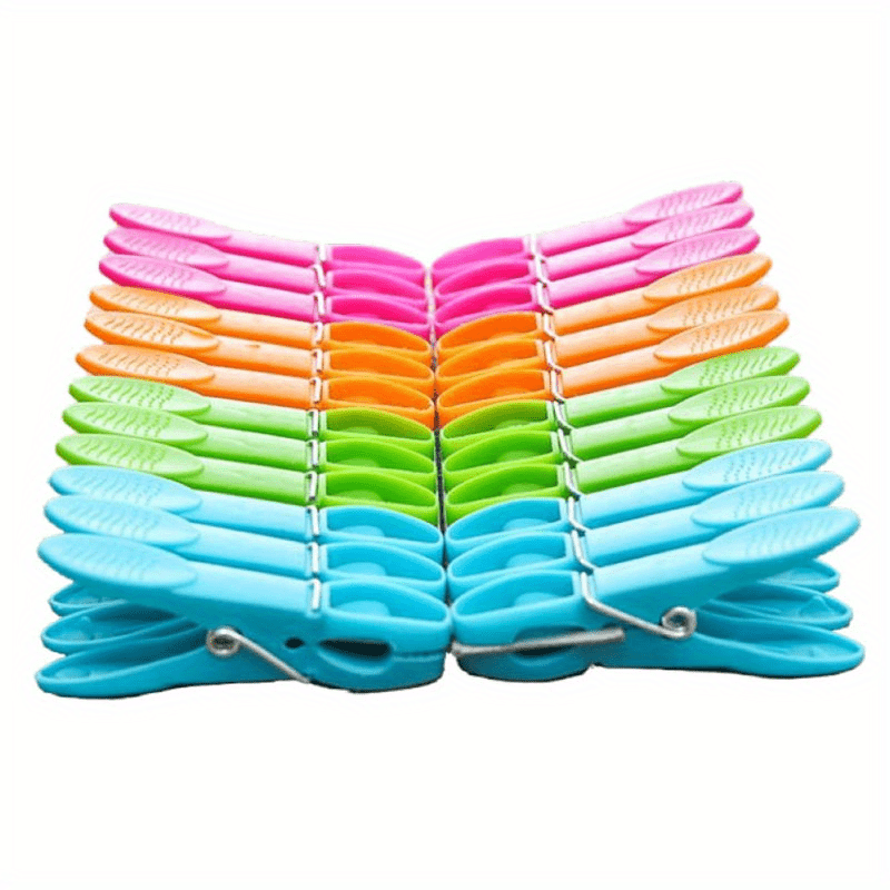 Durable Grip Clothes Pegs for Home and Kitchen Use - Set of 24 Multi-Purpose Plastic Laundry Clips for Towels, Socks, and Bed Sheets.