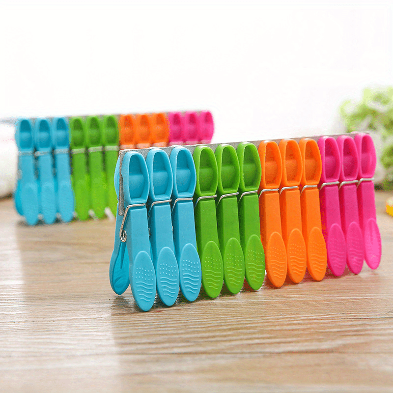 Durable Grip Clothes Pegs for Home and Kitchen Use - Set of 24 Multi-Purpose Plastic Laundry Clips for Towels, Socks, and Bed Sheets.