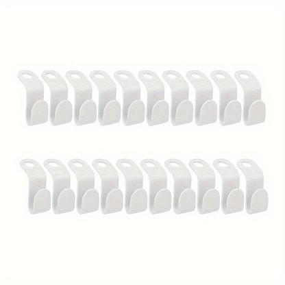 Set of 20 space-saving clothes hangers with mini connection hooks for wall-mounted storage in wardrobes or ties.