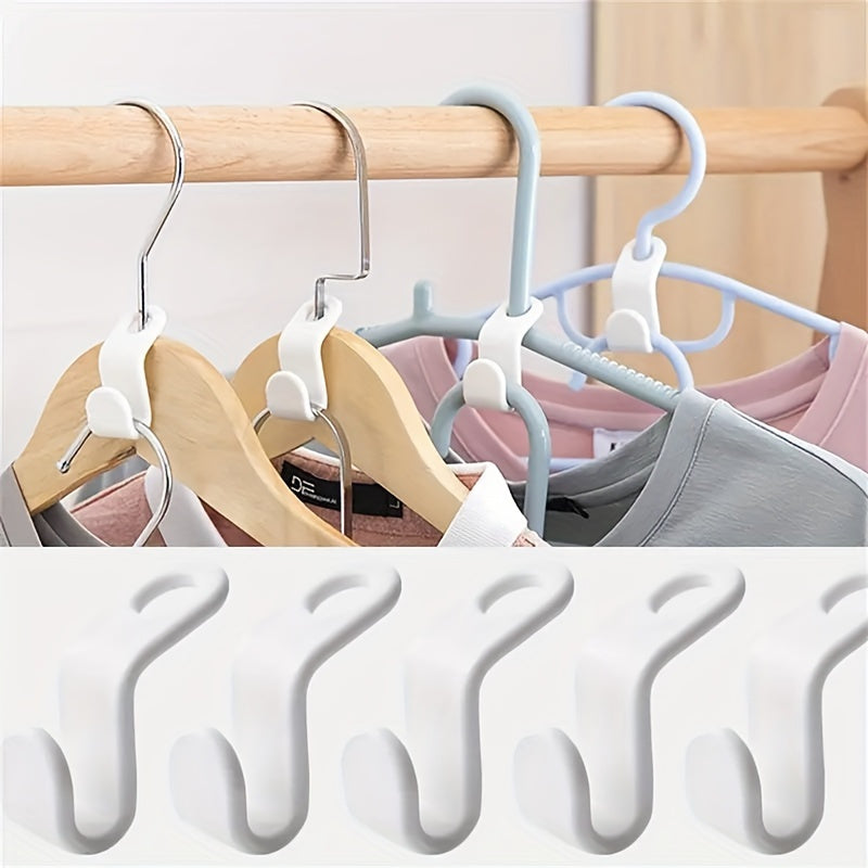 Set of 20 space-saving clothes hangers with mini connection hooks for wall-mounted storage in wardrobes or ties.