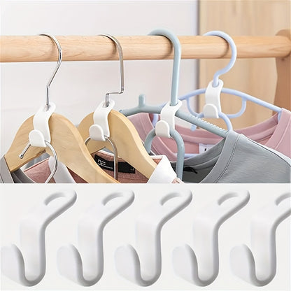 Set of 20 space-saving clothes hangers with mini connection hooks for wall-mounted storage in wardrobes or ties.