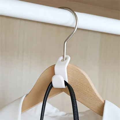 Set of 20 space-saving clothes hangers with mini connection hooks for wall-mounted storage in wardrobes or ties.