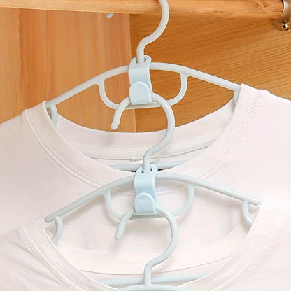 Set of 20 space-saving clothes hangers with mini connection hooks for wall-mounted storage in wardrobes or ties.