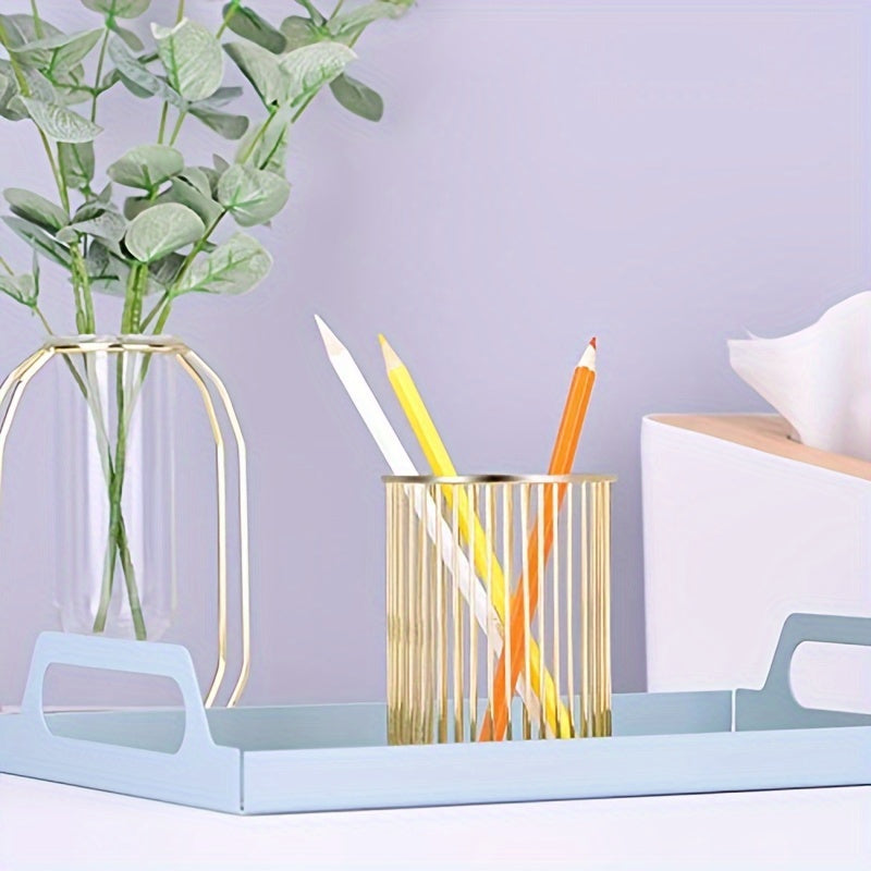 Stylish metal makeup brush holder doubles as a pen and pencil cup.