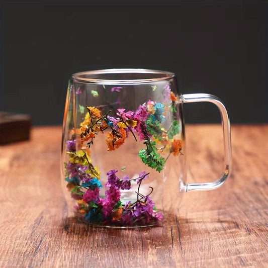 Enjoy your favorite hot or cold beverages in this stylish and durable double-walled glass coffee mug featuring a real flower design. Perfect for use at home or in the office.