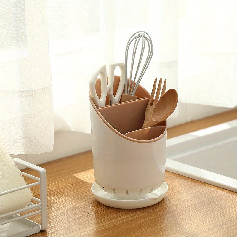 Electricity is not required for this durable plastic utensil holder with a draining tray. It features a dual-layer design and is perfect for organizing kitchen cutlery and utensils in an open-storage style.