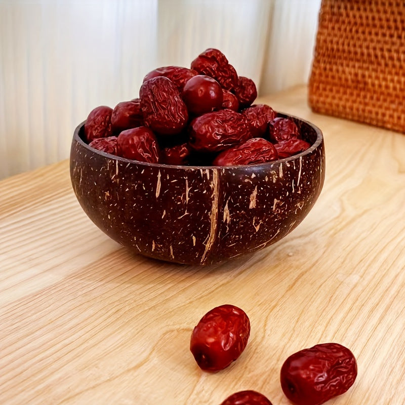 Handmade coconut shell bowl, ideal for serving salads, fruits, and desserts in kitchens or restaurants.