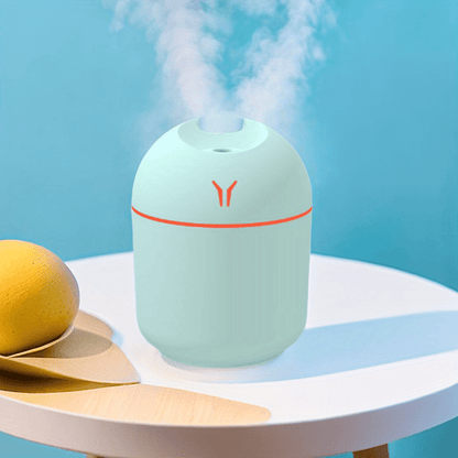 USB Mini Air Humidifier: Aroma Diffuser for Home & Car - Silent Mist Maker with LED Light.