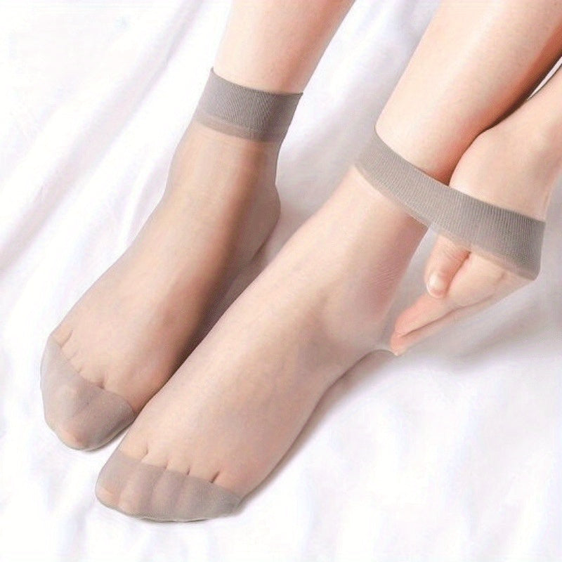 10 pairs of summer silk socks for women, made with thin knit fabric that is anti-hook and invisible. Available in solid black, grey, and light beige. Made with 100% silk and weighs 2g/m².