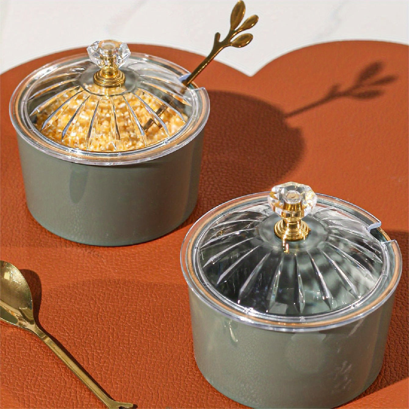 Handmade Nordic luxury PS condiment jar with spoon and lid for kitchen seasoning storage.