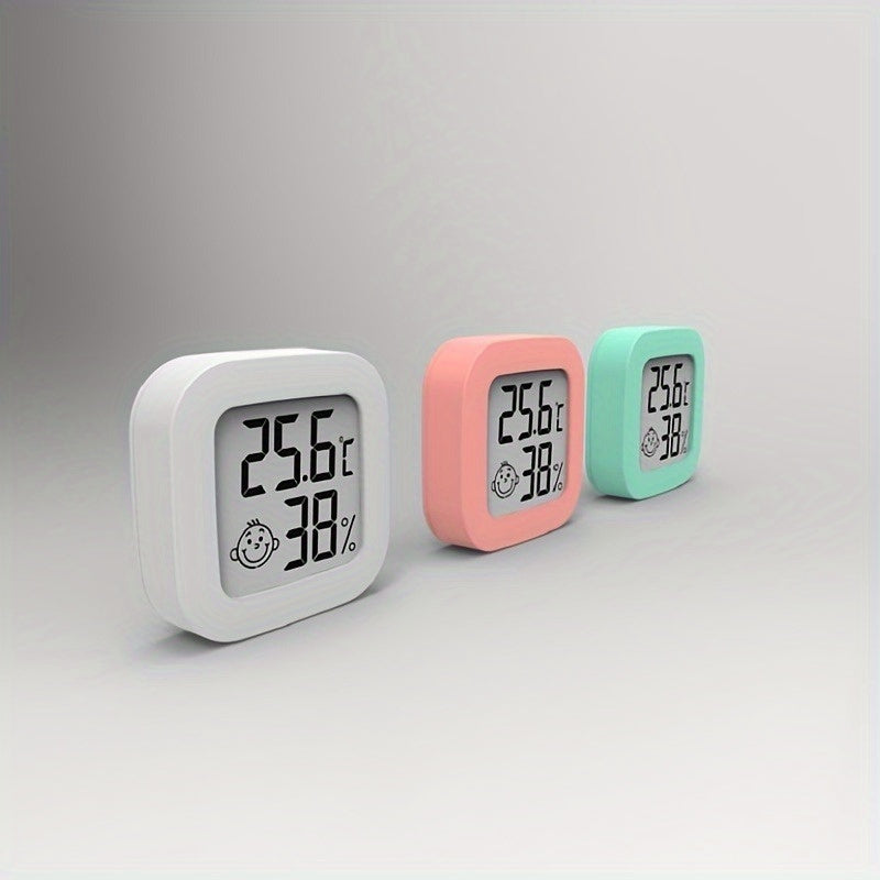 Smart Smile Mini Digital Thermometer accurately monitors room temperature and humidity, includes battery.