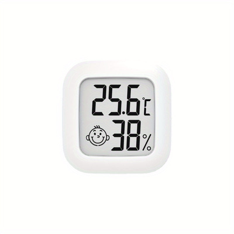 Smart Smile Mini Digital Thermometer accurately monitors room temperature and humidity, includes battery.