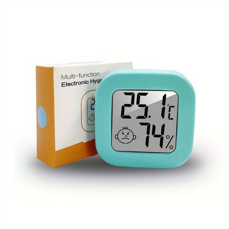 Smart Smile Mini Digital Thermometer accurately monitors room temperature and humidity, includes battery.