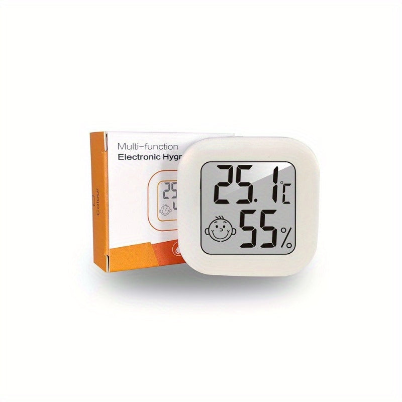 Smart Smile Mini Digital Thermometer accurately monitors room temperature and humidity, includes battery.