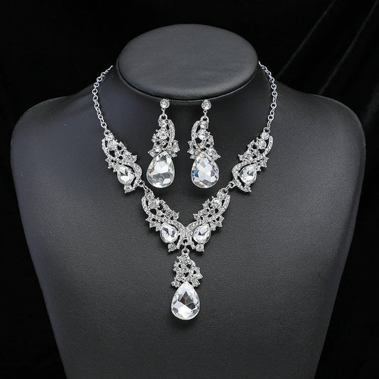 Vintage charm gem necklace and earrings set, perfect for a bride's wedding banquet. Consists of 3 pieces.