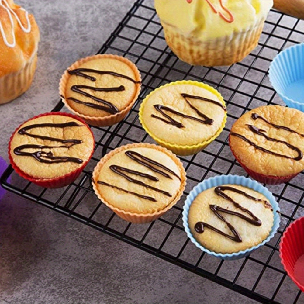 Set of 12 vibrant silicone muffin cups, perfect for baking and decorating cupcakes. These reusable liners are made from food-safe materials, making them a must-have accessory for your kitchen.