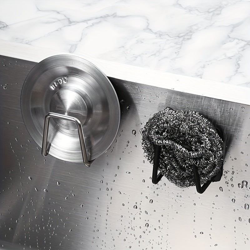 Stainless steel sponge holder mounts on wall for easy access, keeps surfaces clean.