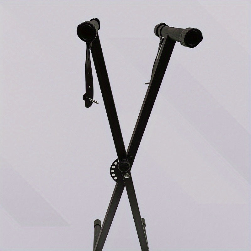 X-shaped piano stand for electronic piano. Easy disassembly and assembly. Adjustable height.