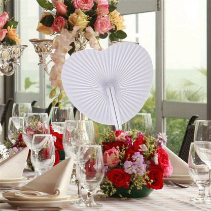 This set includes 10 vibrant heart-shaped folding handheld paper fans with silvery plastic handles. Perfect for birthday parties, weddings, and gifts, these fans feature playful designs such as cats, pumpkins, and rainbows.