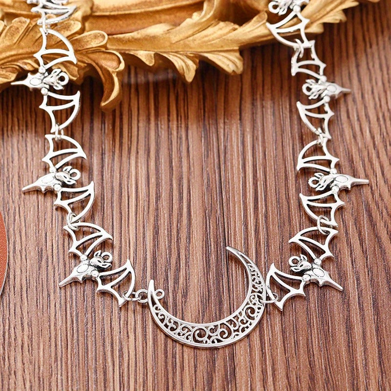 Stainless Steel Bat and Crescent Moon Choker Necklace, featuring a Punk Style, perfect for Hip Hop Collar for Women. This versatile piece is ideal for daily wear and vacation accessorizing. A must-have all-season jewelry item.