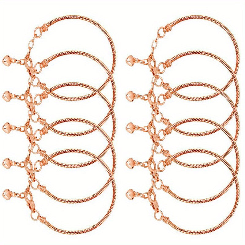 Kit includes 10 pieces of copper snake chain bracelets, each silver plated with a heart charm and lobster clasp. Also includes large hole spacer beads, perfect for creating fashionable DIY jewelry accessories for women and girls.