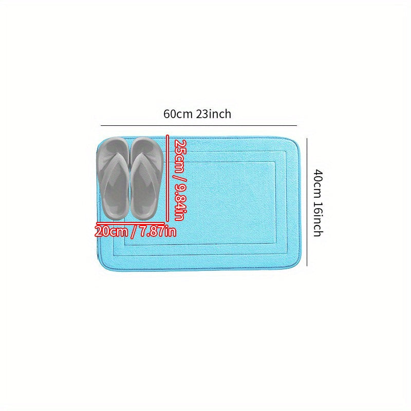 Soft and plush bath mat made of non-slip flannel material, perfect for the bathroom. This machine washable polyester rug features an anti-skid bottom for safety. Quick-drying and absorbent, this rectangular floor mat is ideal for use in the tub or