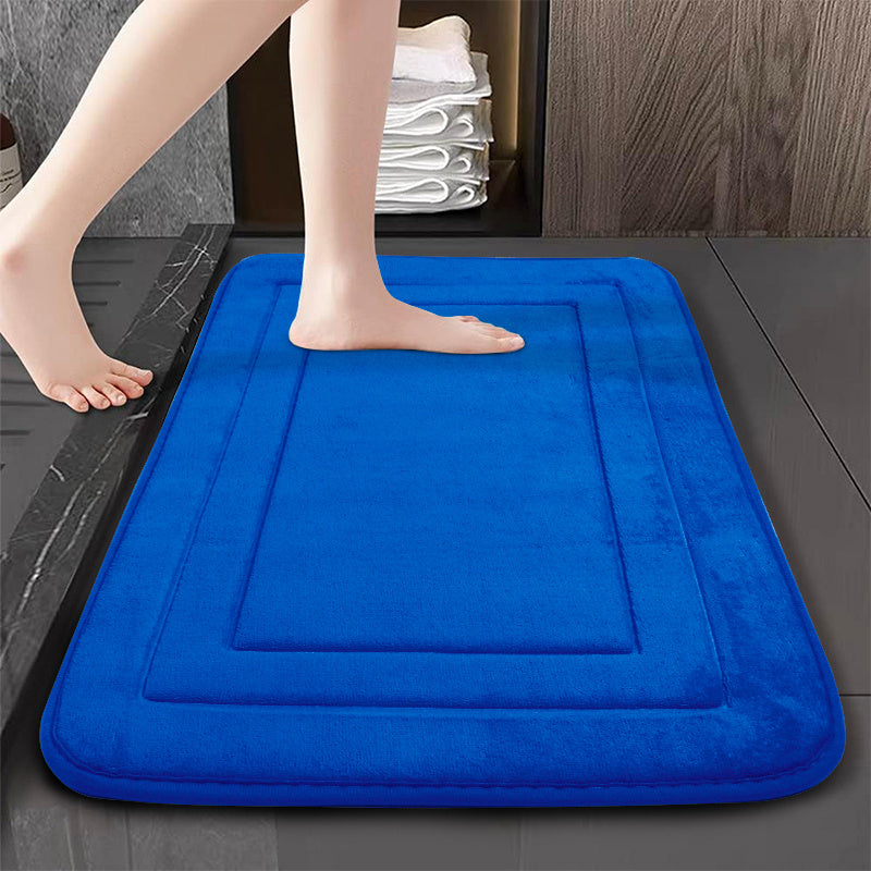 Soft and plush bath mat made of non-slip flannel material, perfect for the bathroom. This machine washable polyester rug features an anti-skid bottom for safety. Quick-drying and absorbent, this rectangular floor mat is ideal for use in the tub or