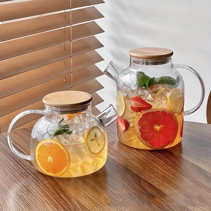 Large capacity Japanese-style glass pitcher, heat-resistant and perfect for iced tea and juices, available in two sizes, ideal for home use.