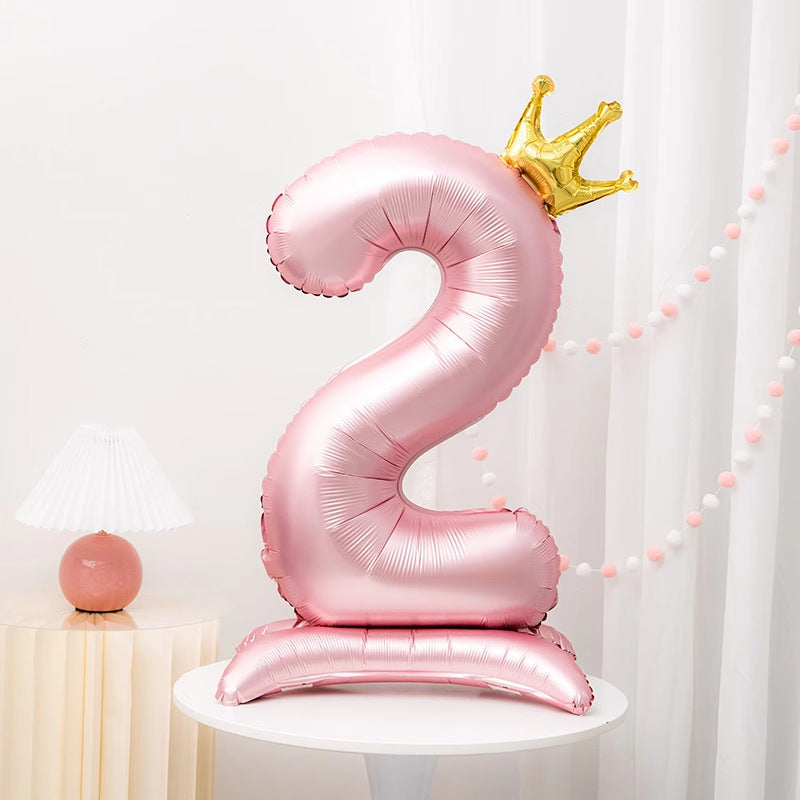 42" Pink Crown Number Balloon ideal for birthdays, anniversaries, and adult celebrations. Made of durable aluminum foil for standing decoration.