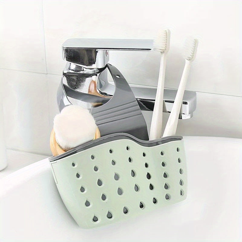 Adjustable Kitchen Sink Organizer Rack - Features Double Wall Hanging Baskets, Drainage System, and Suction Cup Attachment for Soap and Sponge Storage. Made of Durable Plastic and Silicone, this Space-Saving Design is Perfect for Organizing Kitchen Sink