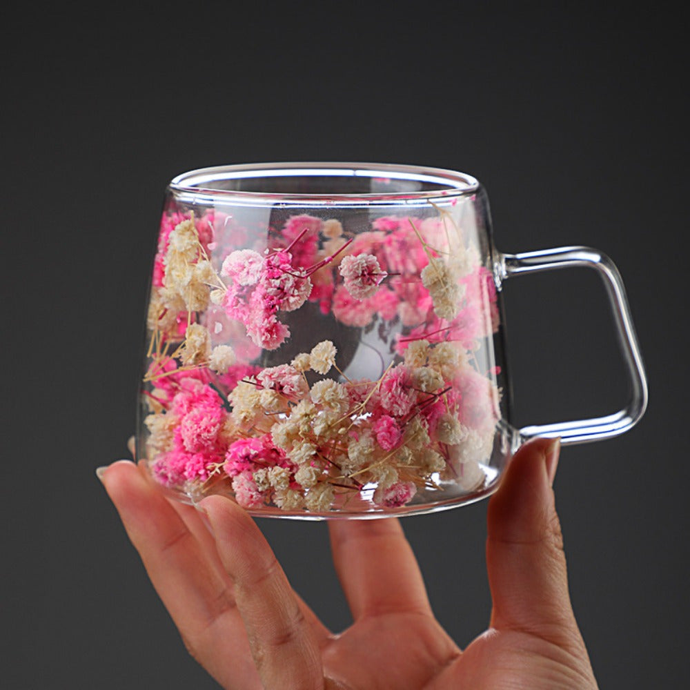 200ML double-wall insulated glass mug with handle features a floral pattern design for hot and cold beverages. Hand wash only.