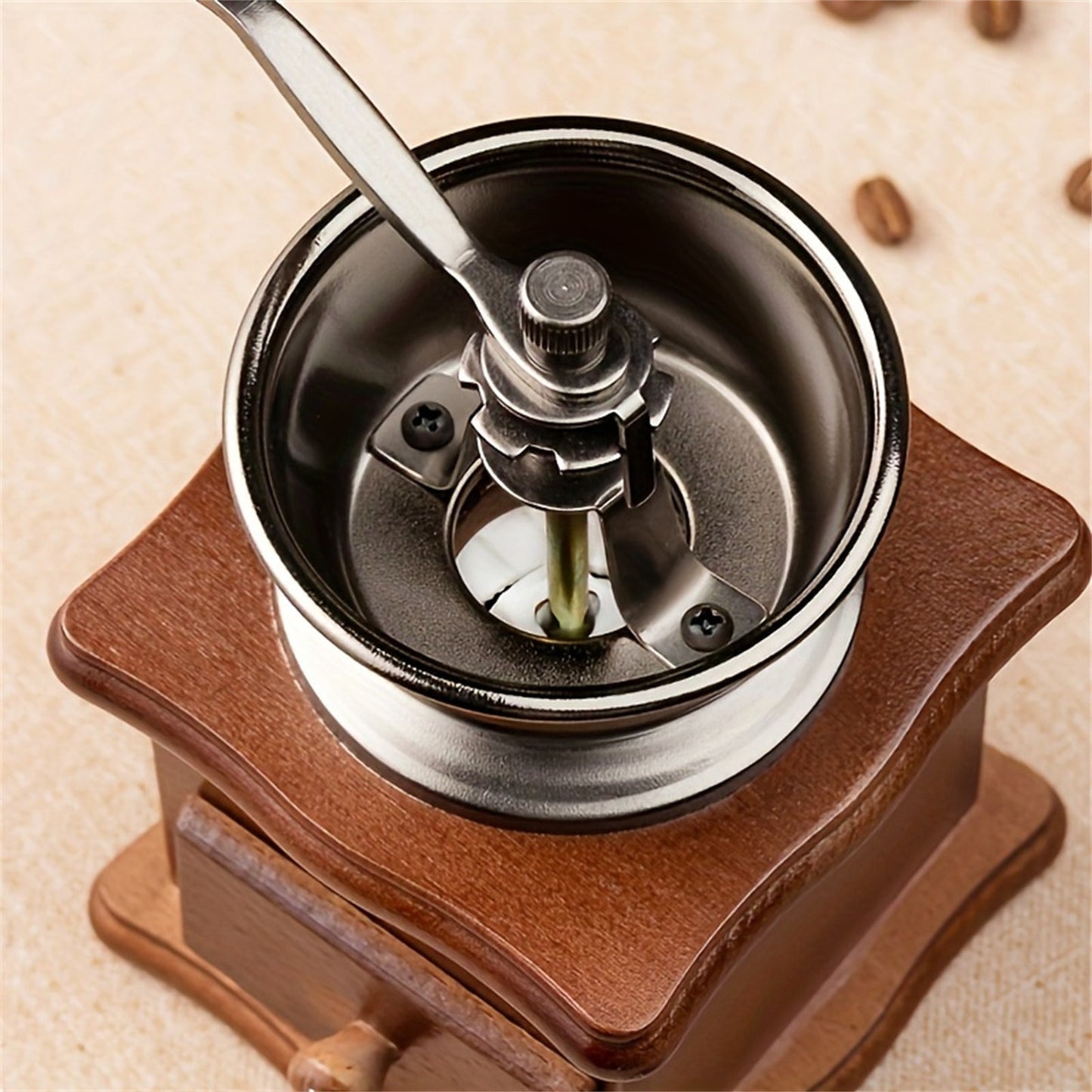 Gift the perfect item for home or office with this hand-cranked wooden coffee bean mill, a stainless steel manual espresso grinder that delivers fresh ground coffee.