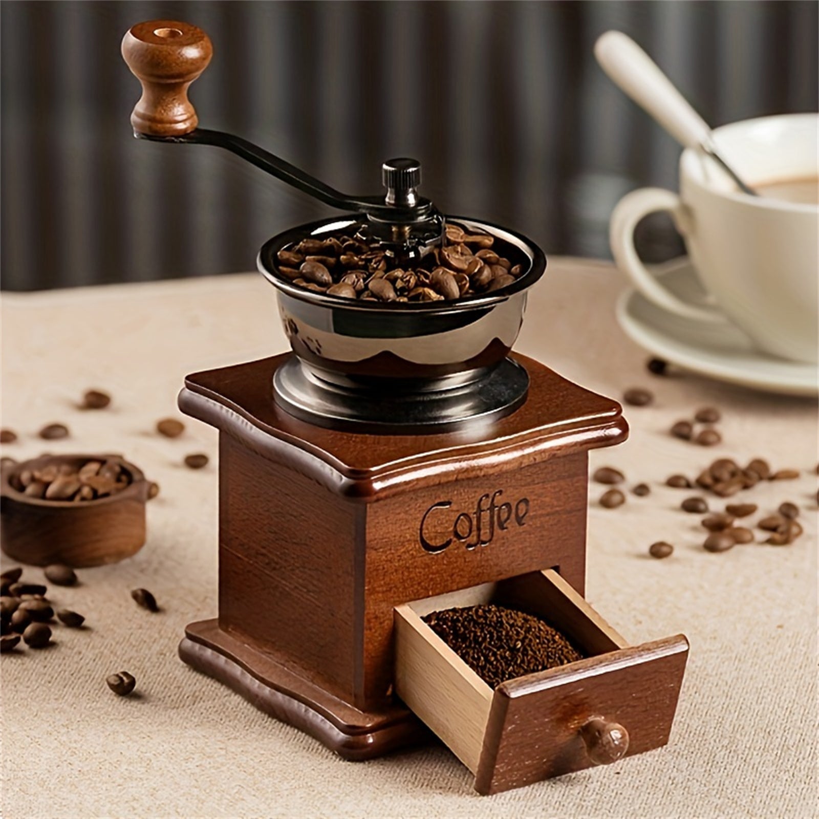 Gift the perfect item for home or office with this hand-cranked wooden coffee bean mill, a stainless steel manual espresso grinder that delivers fresh ground coffee.