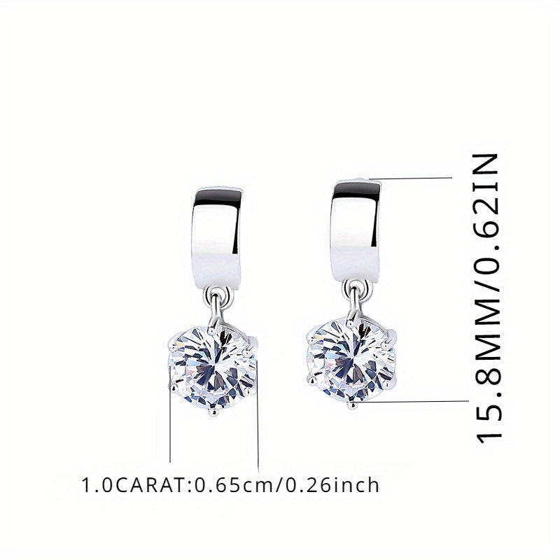 These Korean version 925 sterling silver stud earrings feature 1 carat Moissanite stones, perfect for both men and women with a high-end design sense. The creative and versatile design is perfect for daily wear, dates, parties, travel, vacations