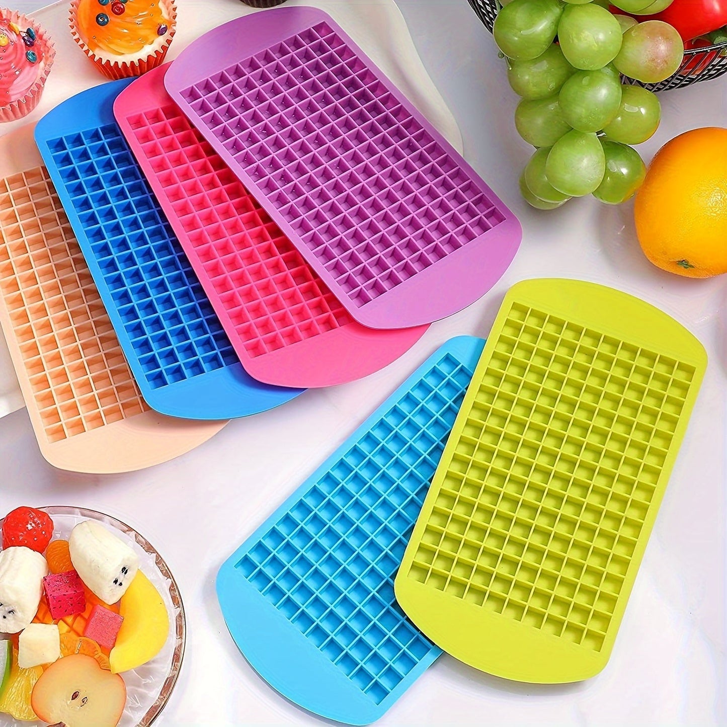 1pc Silicone Ice Cube Tray with 160 grids, perfect for freezing mini food grade ice cubes. This silicone foldable ice mold is the perfect addition to your kitchen accessories. Say goodbye to boring ice cubes and hello to the Ice Breaker Ice Grid Tray