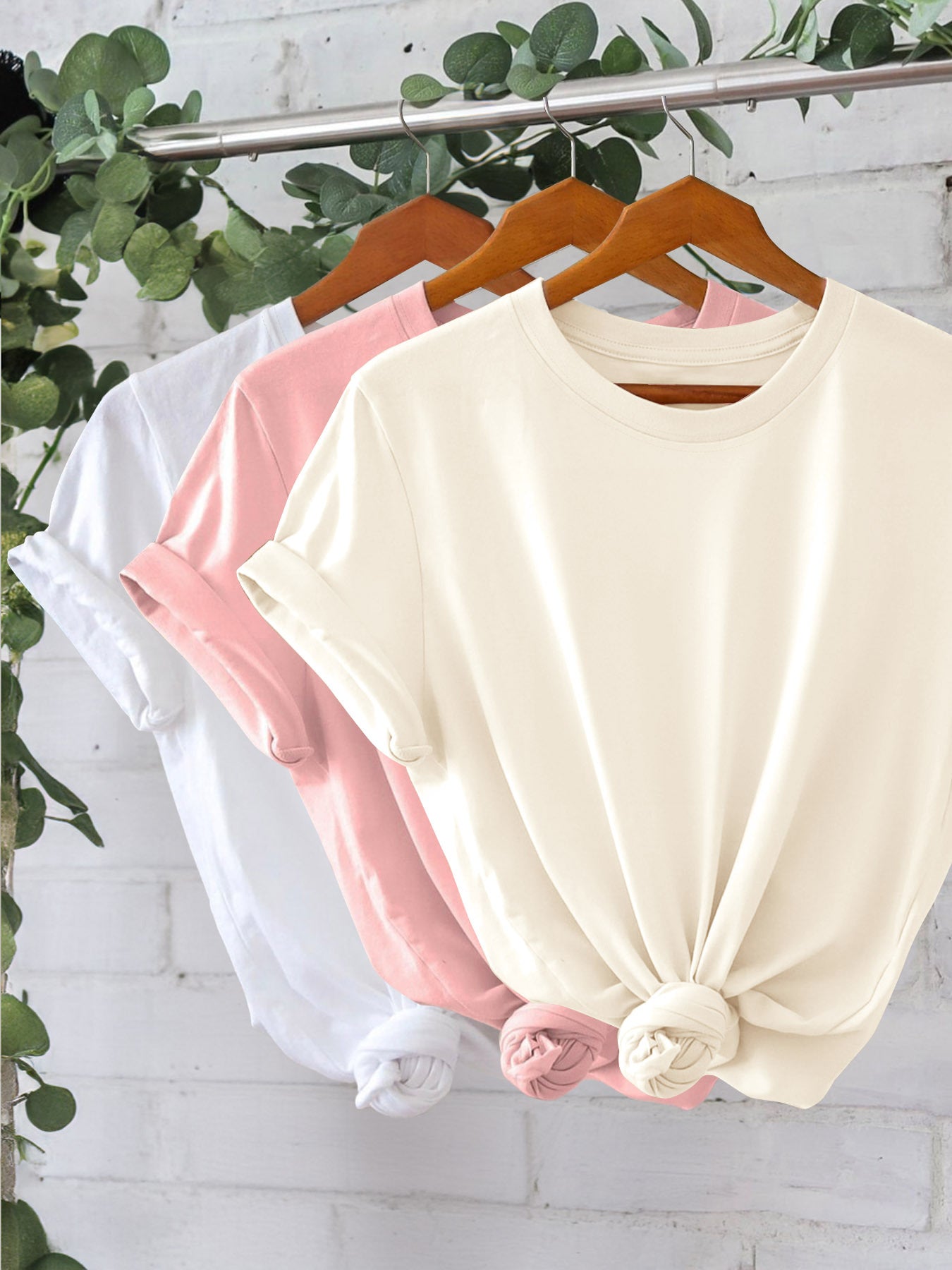 Set of 3 women's solid color T-shirts with short sleeves, crew necks, and knot detail, perfect for summer and spring. Machine washable and lightweight.