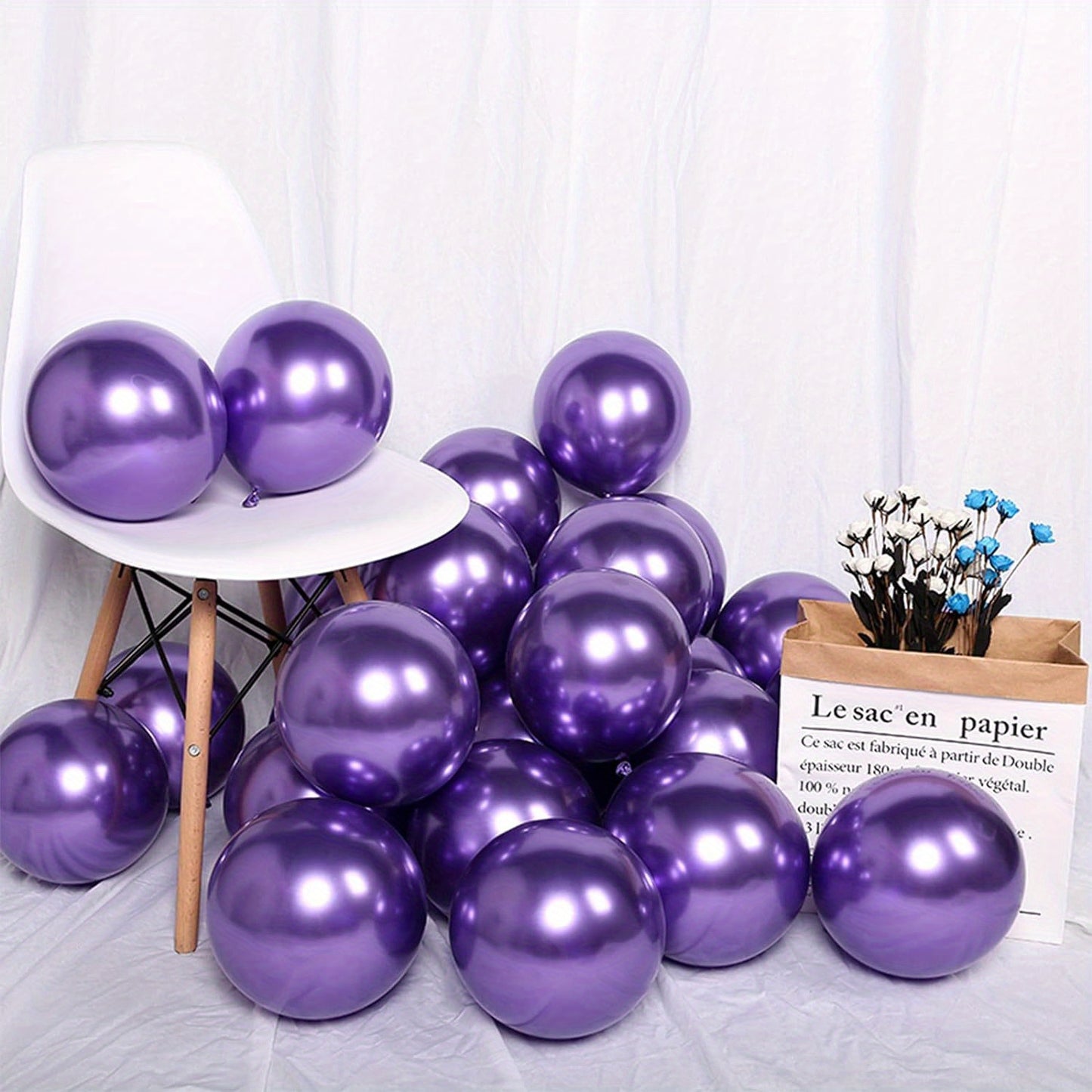 Set of 50 metallic pink and purple macaron balloons and confetti for various parties and celebrations.