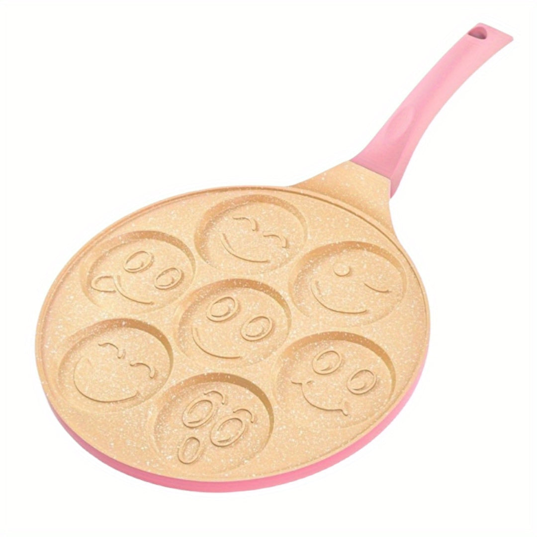 Mini pancakes made easy with the Joyful Face Mini Pancake Pan! Featuring 7 fun designs, this non-stick aluminum skillet is perfect for creating the perfect breakfast or brunch. Dishwasher safe and ideal for parties and birthdays.