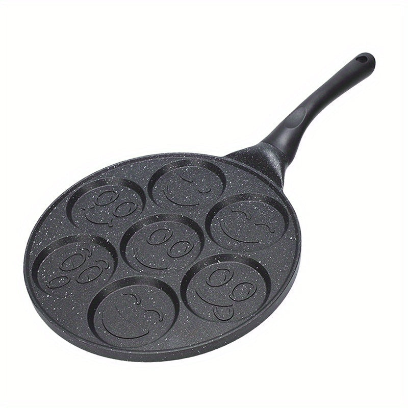 Mini pancakes made easy with the Joyful Face Mini Pancake Pan! Featuring 7 fun designs, this non-stick aluminum skillet is perfect for creating the perfect breakfast or brunch. Dishwasher safe and ideal for parties and birthdays.