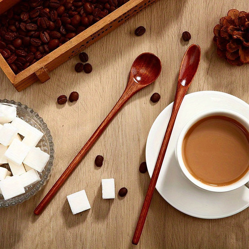 1/3 wooden coffee spoons with long handles, perfect for mixing in the kitchen