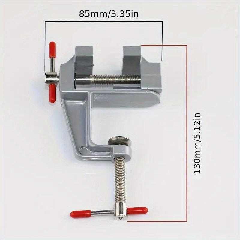 Mini aluminum bench vise with adjustable table clamp for DIY projects.